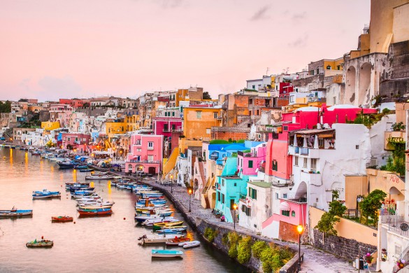 sunrise over La Corricella - small fishermanns village on the Island Procida near naples, italy shutterstock_155887397-2