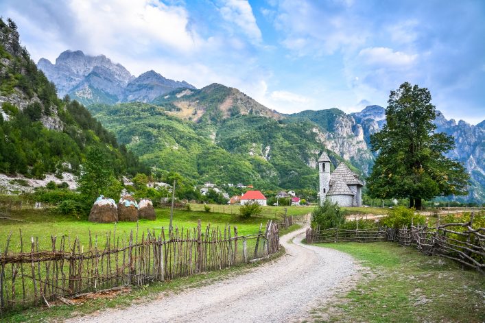 Village with an ancient church in the mountains
